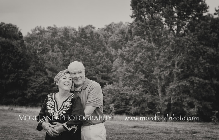 schroll family, love, jovial, smiles, sweet, 50 year anniversary, congratulations, posing by tree, schroll close, black and white photography, mikemoreland, morelandandphoto, stuck together forever