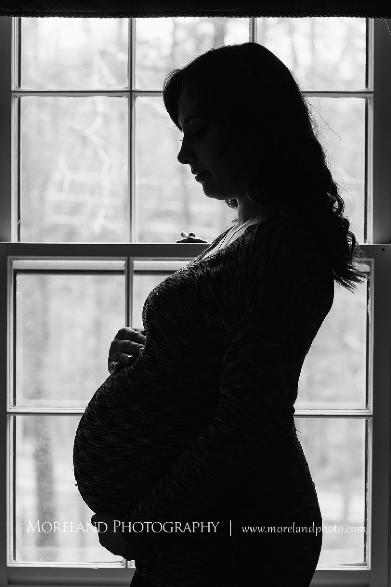 The silhouette of a pregnant woman standing by a window, hollywood maternity, beautiful, serene, love, joy, happiness, classic, timeless