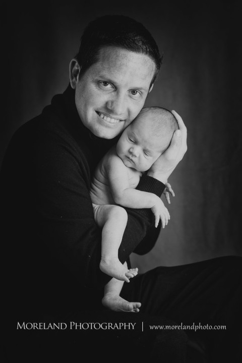 A man holding his newborn baby to his cheek, Atlanta Family Photography, Family Photographer Atlanta, Atlanta Photographer, Moreland Photography, Mike Moreland, Four kids, Large family, Fall Family Pictures, 