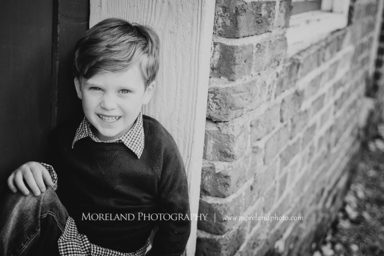 Little boy sitting by a door, Atlanta Family Photography, Family Photographer Atlanta, Atlanta Photographer, Moreland Photography, Mike Moreland, Four kids, Large family, Fall Family Pictures, 