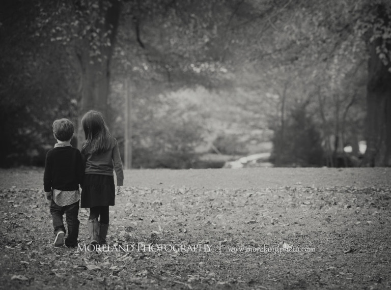 Gray scale of brother and sister walking in a park during fall, Atlanta Family Photography, Family Photographer Atlanta, Atlanta Photographer, Moreland Photography, Mike Moreland, Four kids, Large family, Fall Family Pictures, 