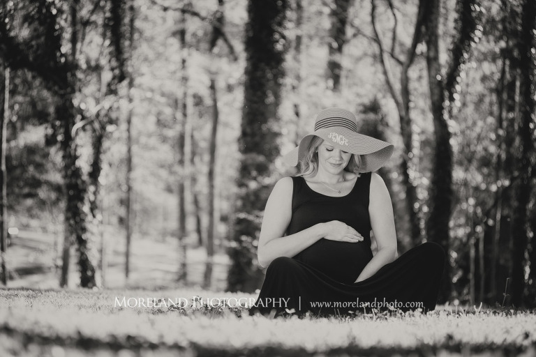 Pregnant woman sitting on the grass with a sun hat on, Atlanta Maternity Photographer, Maternity Photos Atlanta, Georgia Maternity Photography, Moreland Photography, Mike Moreland, Outdoor Maternity, Maternity on the River, 