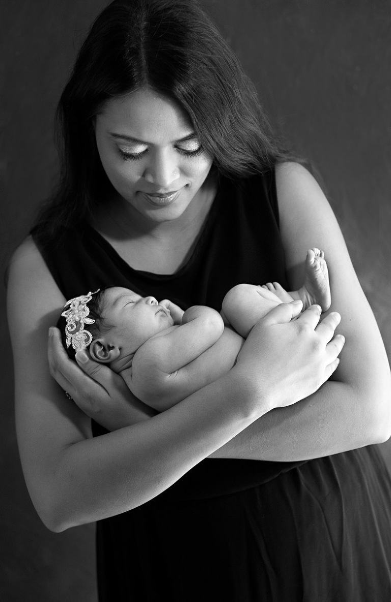 Gray scale of mother cradling her newborn baby girl, Atlanta Newborn Photographer, Atlanta Newborn Photography, Moreland Photography, Mike Moreland, bundle of joy, newborn, little angel, tot, girl, kid, buttercup, innocent, happiness