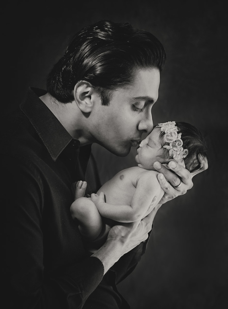Gray scale of father holding his newborn baby girl while kissing her nose, Atlanta Newborn Photographer, Atlanta Newborn Photography, Moreland Photography, Mike Moreland, bundle of joy, newborn, little angel, tot, girl, kid, buttercup, innocent, happiness