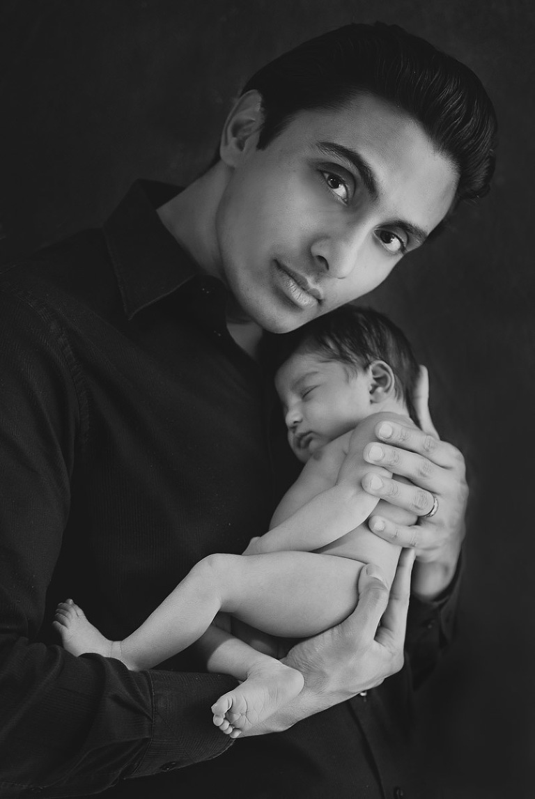 Gray scale of father holding his newborn baby girl to his chest, bundle of joy, newborn, little angel, tot, girl, kid, buttercup, innocent, happiness