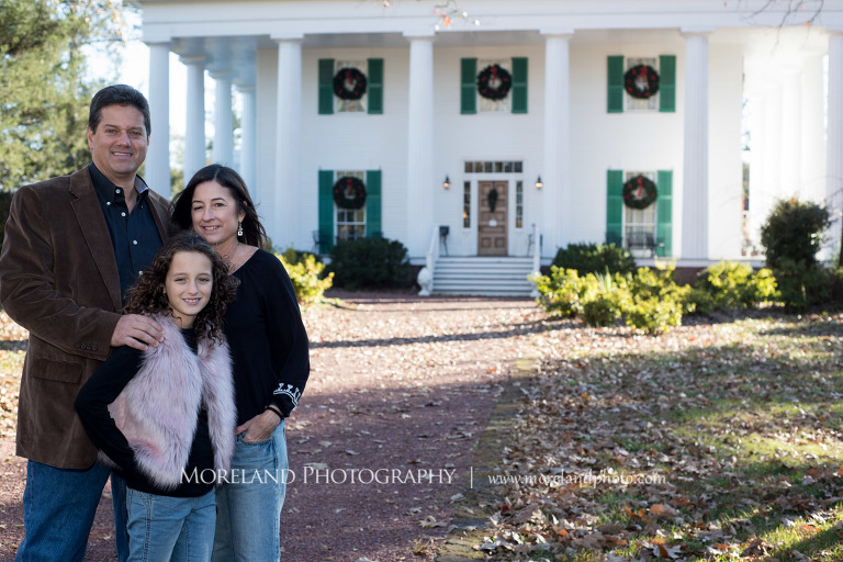Roswell Family, Portrait of family of 3 standing next to each other in front white home outside during daytime, Atlanta Portrait Photographer, Atlanta Child Photographer, Atlanta Family Photographer, Moreland Photography, Mike Moreland