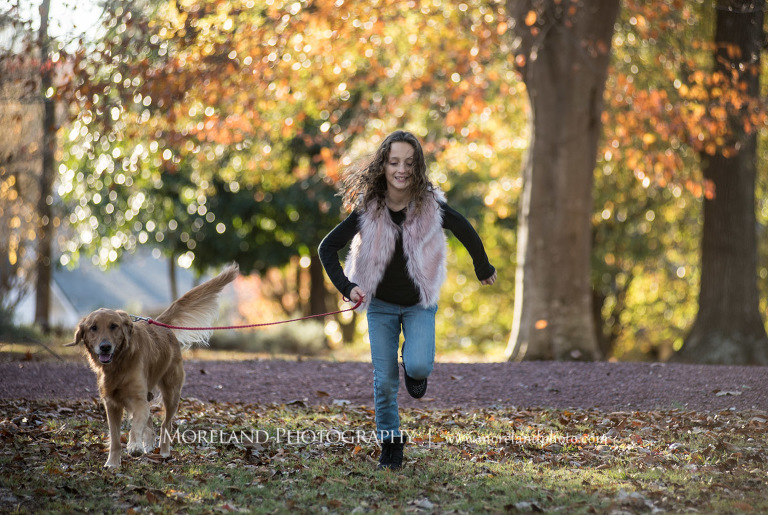 Roswell Family, Portrait of little girl running with dog outside during the autmun season, Atlanta Portrait Photographer, Atlanta Child Photographer, Atlanta Family Photographer, Moreland Photography, Mike Moreland