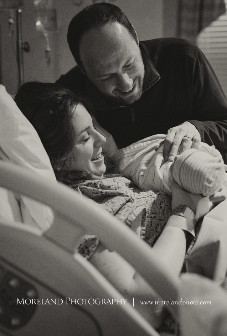 birth photography, birth newborn photography, Grey-scale image of a happy couple holding their newborn son for the first time, Atlanta Newborn Photography, Newborn Photographer Atlanta, Birth Photography, Natural Birth Photography, Hospital Photographer, Moreland Photography, Mike Moreland