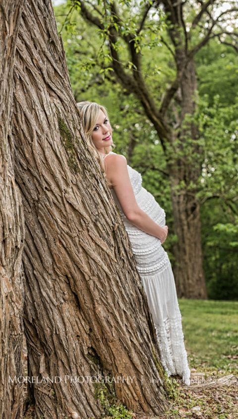Portrait of pregnant woman leaning against a tree holding her belly, Maternity Photography, Atlanta Maternity, Lifestyle Maternity Photography, Styled Maternity Shoot, Moreland Photography, Mike Moreland, Outdoor Maternity, Nature Maternity, 