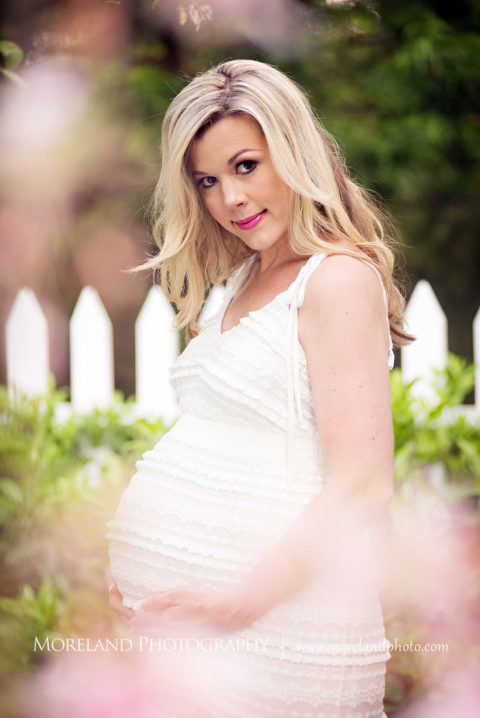 outdoor maternity shoot, Portrait of pregnant woman smiling holding her belly outside during the daytime, Maternity Photography, Atlanta Maternity, Lifestyle Maternity Photography, Styled Maternity Shoot, Moreland Photography, Mike Moreland, Outdoor Maternity, Nature Maternity, 