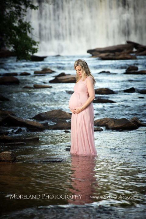 Portrait of pregnant woman in a pink gown standing in river in front of a waterfall, Maternity Photography, Atlanta Maternity, Lifestyle Maternity Photography, Styled Maternity Shoot, Moreland Photography, Mike Moreland, Outdoor Maternity, Nature Maternity, 