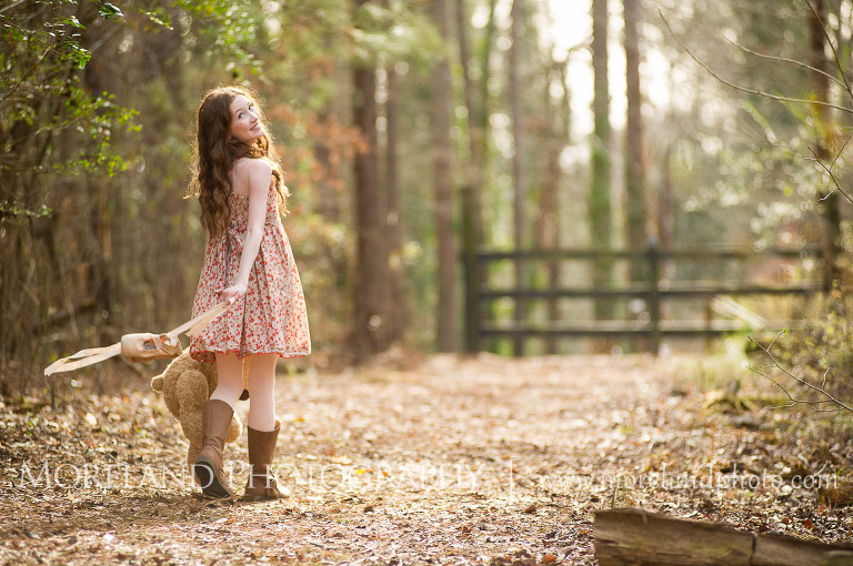 girl walking in wooded pathway with a bear and ballet shoes, Childen Ballet, Child Portraits, Atlanta Photgraphy, Moreland Photography, Roswell Portraits, ballet shoes, dancer, 