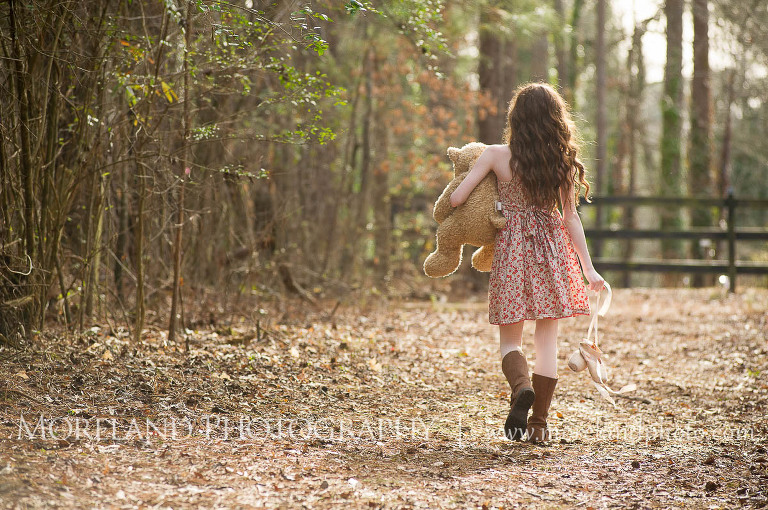 girl walking in wooded pathway carrying a stuffed bear, Childen Ballet, Child Portraits, Atlanta Photgraphy, Moreland Photography, Roswell Portraits, ballet shoes, dancer, 