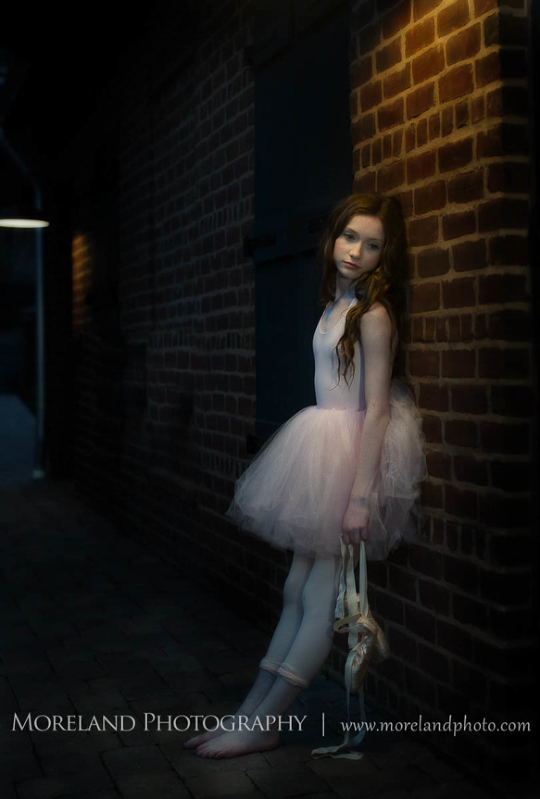 Little ballerina girl in pink tutu against brick wall, Childen Ballet, Child Portraits, Atlanta Photgraphy, Moreland Photography, Roswell Portraits, ballet shoes, dancer, night photography, 