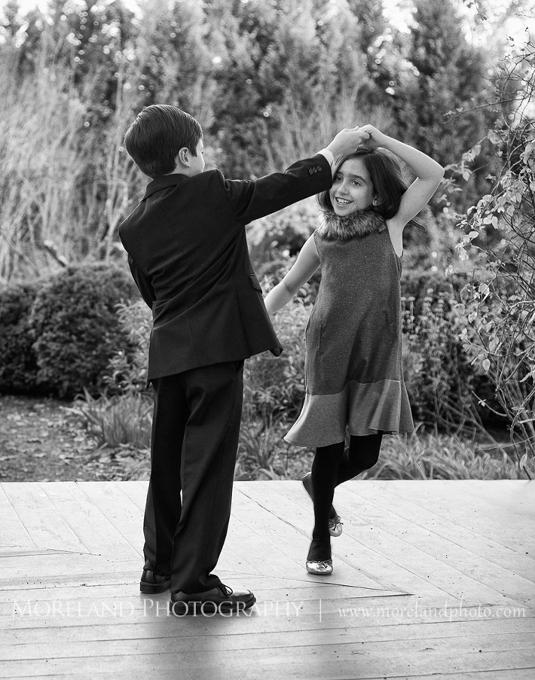 twins dancing with each other in black and white, Twin Portraits, Child Portraits, Atlanta Photgraphy, Lifestyle photography, Moreland Photography, Roswell Portraits, twins, tall grass, brother, sister, black and white,