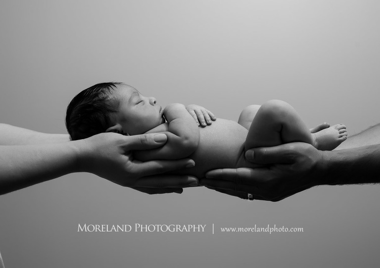 black and white newborn, black and white intimate newborn, intimate newborn, newborn sleeping in hands, newborn sleeping in mom and dads hands, mother and father holding newborn baby, hands holding baby, hands holding newborn, Moreland Photography, atlanta newborn photography, newborn photographer atlanta, Puerto Rico newborn photography, 