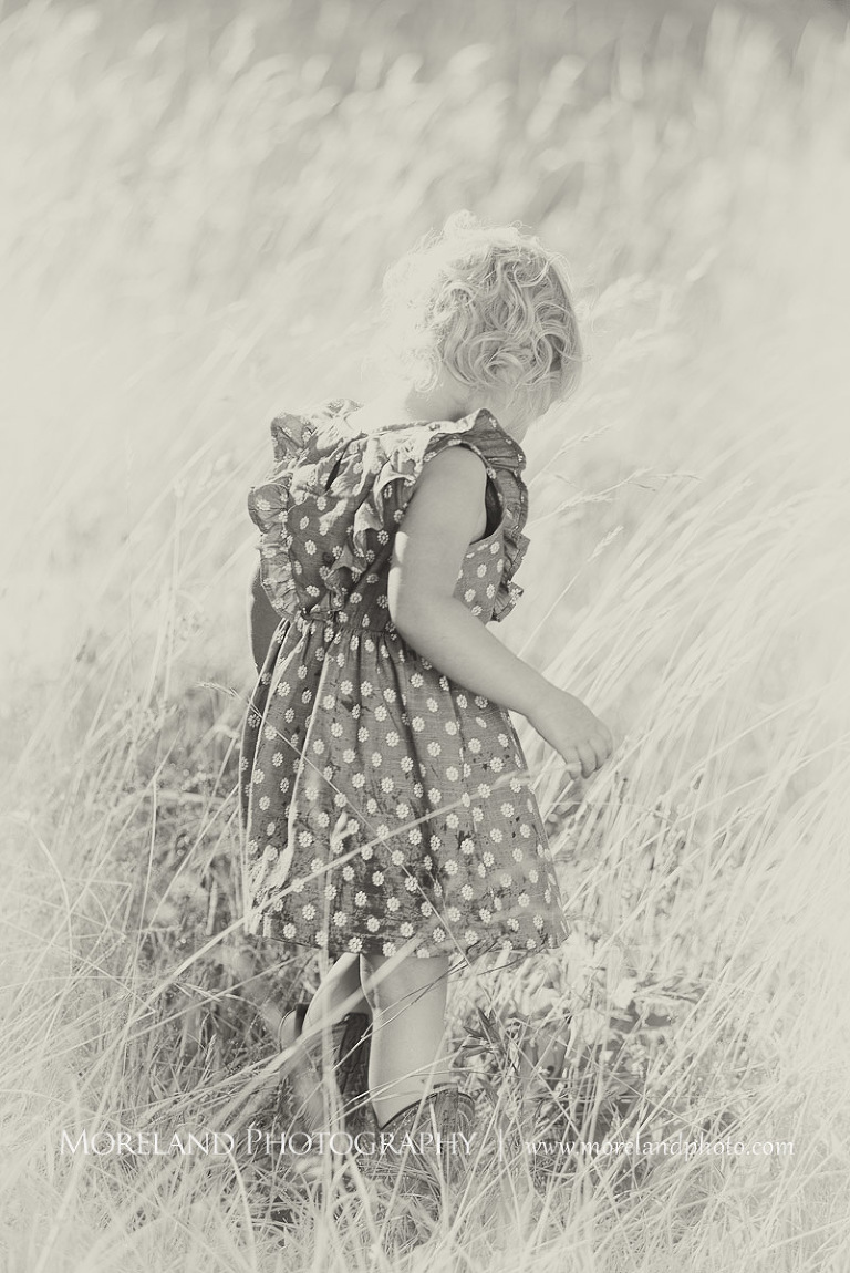 little girl in polka dot dress in field, Mike Moreland, Moreland Photography, wedding photography, Atlanta wedding photography, detailed wedding photography, lifestyle wedding photography, Atlanta wedding photographer,
