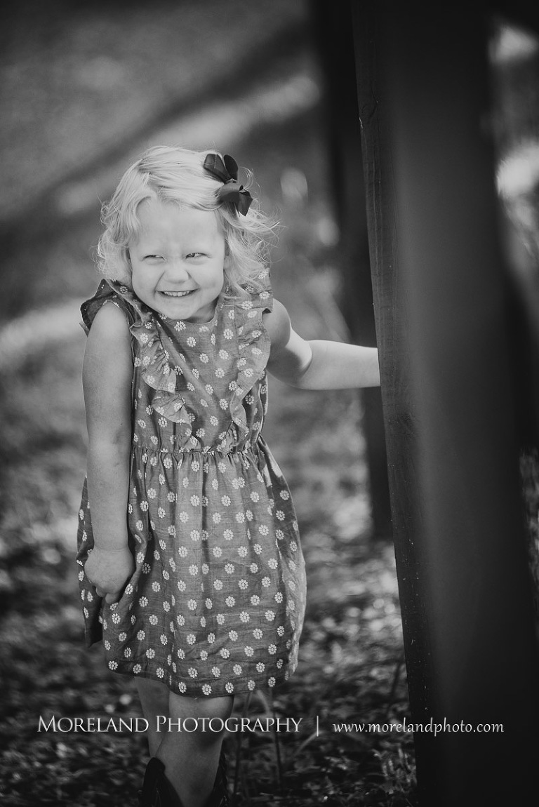 little girl smiling and laughing black and white, Mike Moreland, Moreland Photography, wedding photography, Atlanta wedding photography, detailed wedding photography, lifestyle wedding photography, Atlanta wedding photographer,