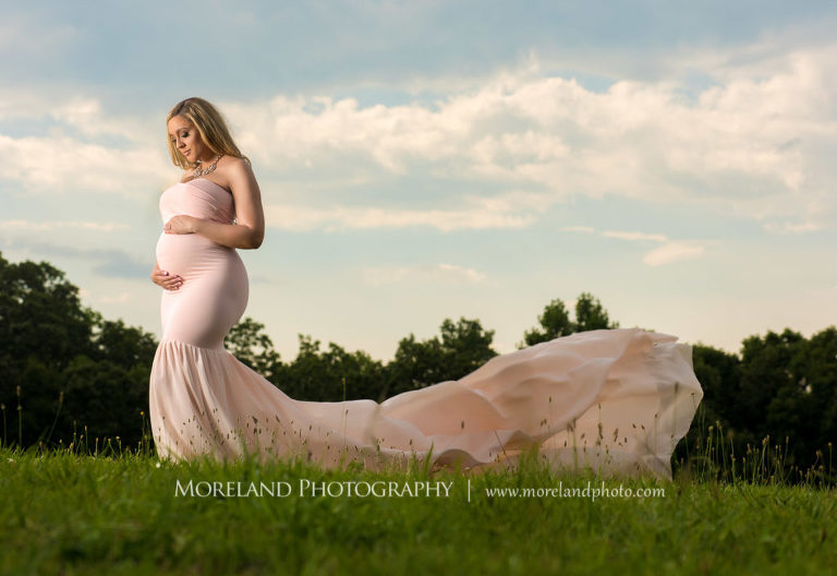 Pregnant woman standing in field wearing pink, flowy maternity dress, spring maternity shoot, Mike Moreland, Moreland Photography, Atlanta Portrait Photographer, Maternity Photography Atlanta