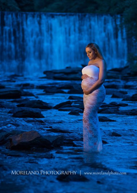 Pregnant woman standing in front of waterfall wearing white, lacey maternity dress, Mike Moreland, Moreland Photography, Atlanta Portrait Photographer, Maternity Photography Atlanta