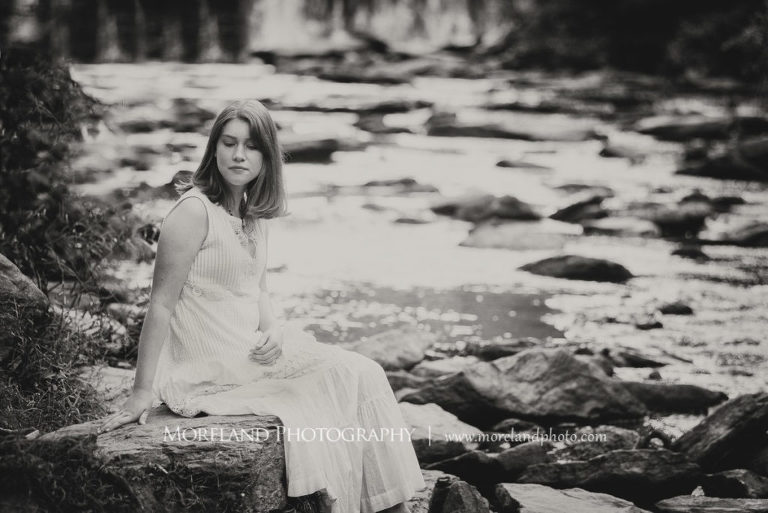 Georgia senior portraits in black and white of a girl sitting on the rocks with a waterfall in the background, Mike Moreland, Moreland Photography, Atlanta Portrait Photographer, Senior Photography Atlanta, Kings Ridge Christian Academy, Nature, Georgia Senior Portrait, Outdoors Photography, Georgia Girl, Black And White, White Dress, Rocks, Waterfall, Rushing Water, Water, Nature