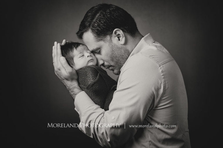 Black and white photo of father holding his sleeping baby boy, Mike Moreland, Moreland Photography, Atlanta Portrait Photographer, Maternity Photography Atlanta, New Born Photography, New Born Photography Atlanta, Baby, Downtown Atlanta, Family, Mother, Father, 