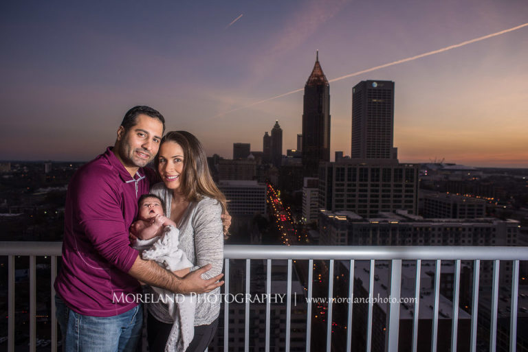 Mother and father with new born baby with Atlanta city skyline in background, Mike Moreland, Moreland Photography, Atlanta Portrait Photographer, Maternity Photography Atlanta, New Born Photography, New Born Photography Atlanta, Atlanta Skyline, Downtown Atlanta, Mother, Father, Baby, New born, Sunset, City skyline,