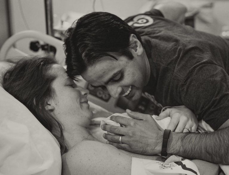 Parents overjoyed with the arrival of baby, The Kahn's birth shoot, Mike Moreland, Moreland Photography, Birth Photography, Atlanta Portrait Photographer, Photography Atlanta, New Born Photography, New Born Photography Atlanta, Baby, Family, Mother, Father, Little Moment Photography, Black and white photography, smiling, joy, mother and child, Father and Child, Baby Boy 