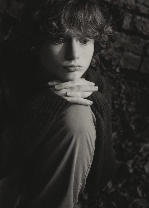 close up black and white portrait of teenager with hands under chin, moody black and white portrait, creative children portrait, Atlanta children photographer
