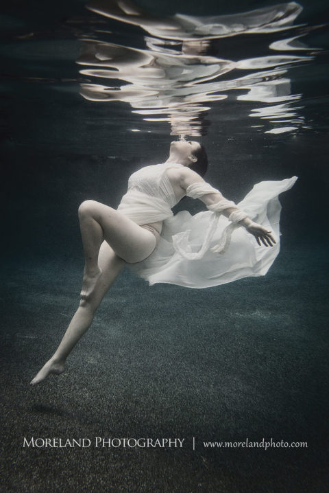 Woman falling back into water in white dress gracefully, underwater pictures, creative photography atlanta, creative edge workshops, moreland photography, creative underwater photo shoot, underwater photography, nikon underwater, Georgia underwater photography, leading underwater photographer, fashion shoot ideas, model photography